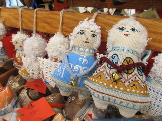 Handmade dolls of cloth with a bell as a gift for a holiday