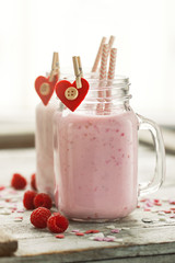 Homemade smoothie with raspberry in jars. Love, eating or valent