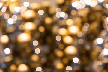 Obraz premium blurred golden christmas lights bokeh
