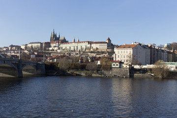 Fototapeta na wymiar Autumn Lesser Town of Prague with gothic Castle above River Vltava, Czech Republic