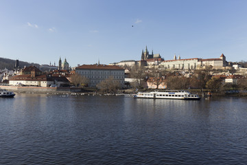 Fototapeta premium Autumn Lesser Town of Prague with gothic Castle above River Vltava, Czech Republic
