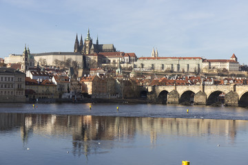 Autumn Lesser Town of Prague with gothic Castle and Charles Bridge, Czech Republic