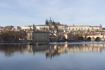 Fototapeta na wymiar Autumn Lesser Town of Prague with gothic Castle and Charles Bridge, Czech Republic