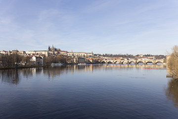 Autumn Lesser Town of Prague with gothic Castle and Charles Bridge, Czech Republic