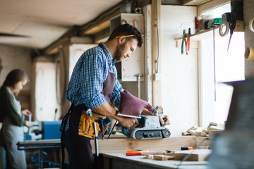 Woodworker planing