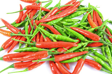 Red and green chili pepper on a white background