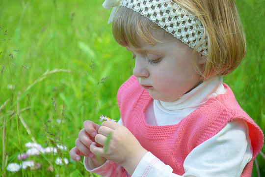 Baby and flowers