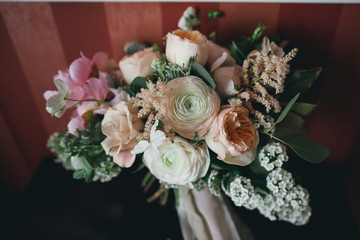 beautiful bridal bouquet lying on the table
