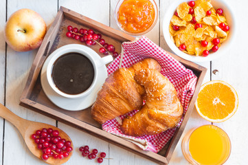 Breakfast on wooden tray