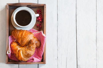 Breakfast on wooden tray