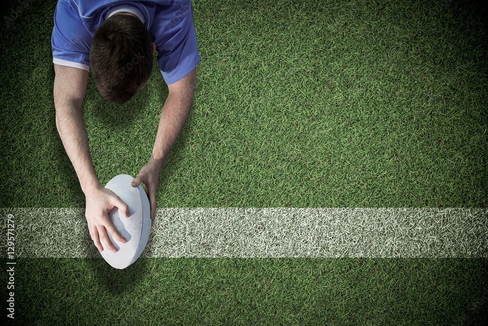 Poster composite image of a rugby player scoring a try