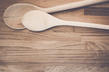 wooden kitchen tools on a natural wood surface