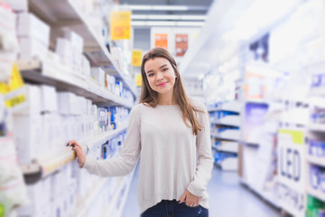 happy female customer shopping in hardware store