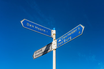 Directional Signs pointing to several destinations on Dutch island Texel.