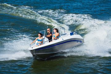  Girls ride on the boat to drift