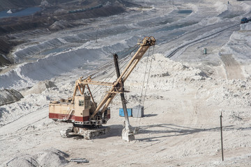 Excavator is working in chalk quarry mining, Belgorod, Russia