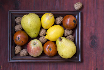Winter fruits on wooden table