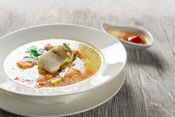 Beautiful presentation of the fish soup.