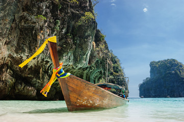 Traditional longtail boats in the famous Maya bay of Phi-phi Leh