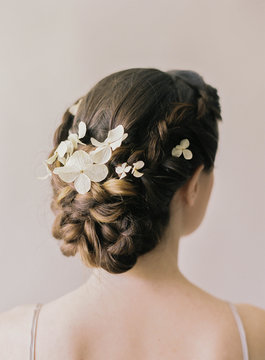 Portrait of bride in bridal wear, focus con hair