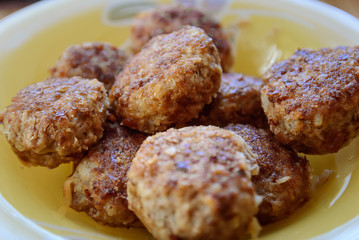 meatball in a pan while frying