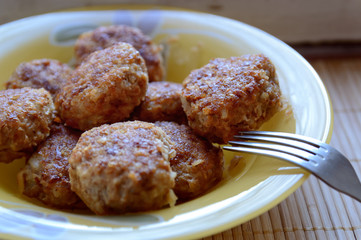 meatball in a pan while frying