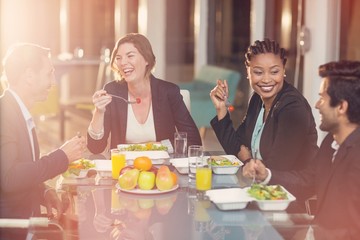 Group of businesspeople having breakfast