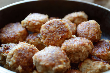 meatball in a pan while frying