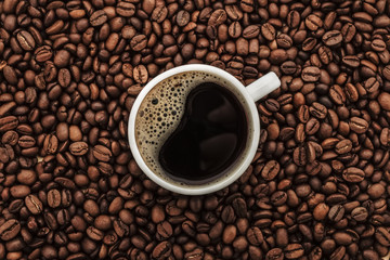 Coffee cup and coffee beans