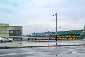 Fototapeta na wymiar Barcelona-El Prat airport - terminal 1 area with taxi bay and cabs