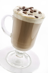 Capuccino in glass cup isolated on white. Path included