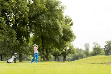 Fototapeta premium Golfer playing on beautiful golf course