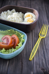 
healthy food in the container - rice, eggs, vegetables
