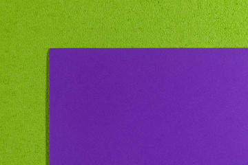 Eva foam ethylene vinyl acetate smooth purple surface on apple green sponge plush background