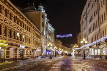Fototapeta na wymiar Christmas illumination on Old Arbat street in Moscow, Russia