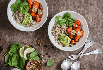 Quinoa and pumpkin bowl. Vegetarian, healthy, diet food concept. On a wooden table, top view. Flat lay