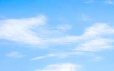 beautiful white clouds on a background of blue sky