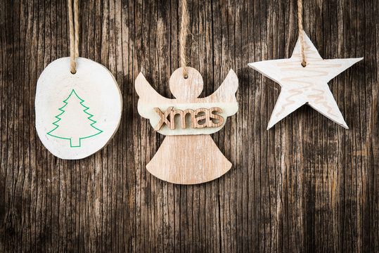 Christmas decorations on rustic wooden background