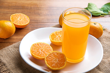 Juicy oranges slices on wooden table. 