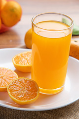 Juicy oranges slices on wooden table. 