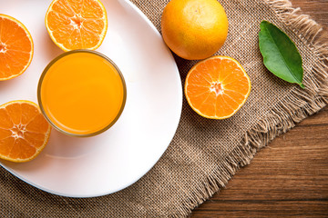Juicy oranges slices on wooden table. Top view