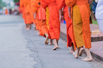 Buddhist priest to go about with a bowl to receive food