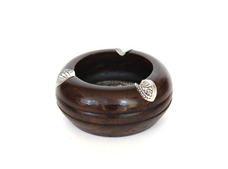 Empty wooden ashtray on white background
