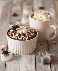 Fruitcake and cacao with marshmallow