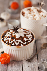 Fruitcake and cacao with marshmallow