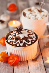 Fruitcake and cacao with marshmallow