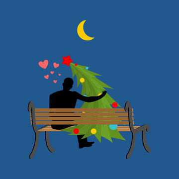 recommend clip art: Christmas Lover. Christmas tree and man looking at moon. Date ni