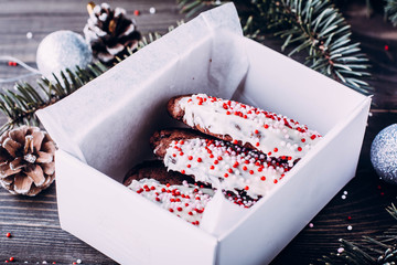 Homemade christmas chocolate cookies in gift whitevbox. Sweet present. Christmas baking with festive decoration