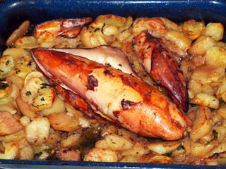 Fried squid stuffed with ham cheese and tentacles