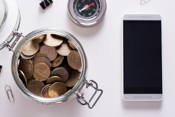 Jar of coins. Saving concept